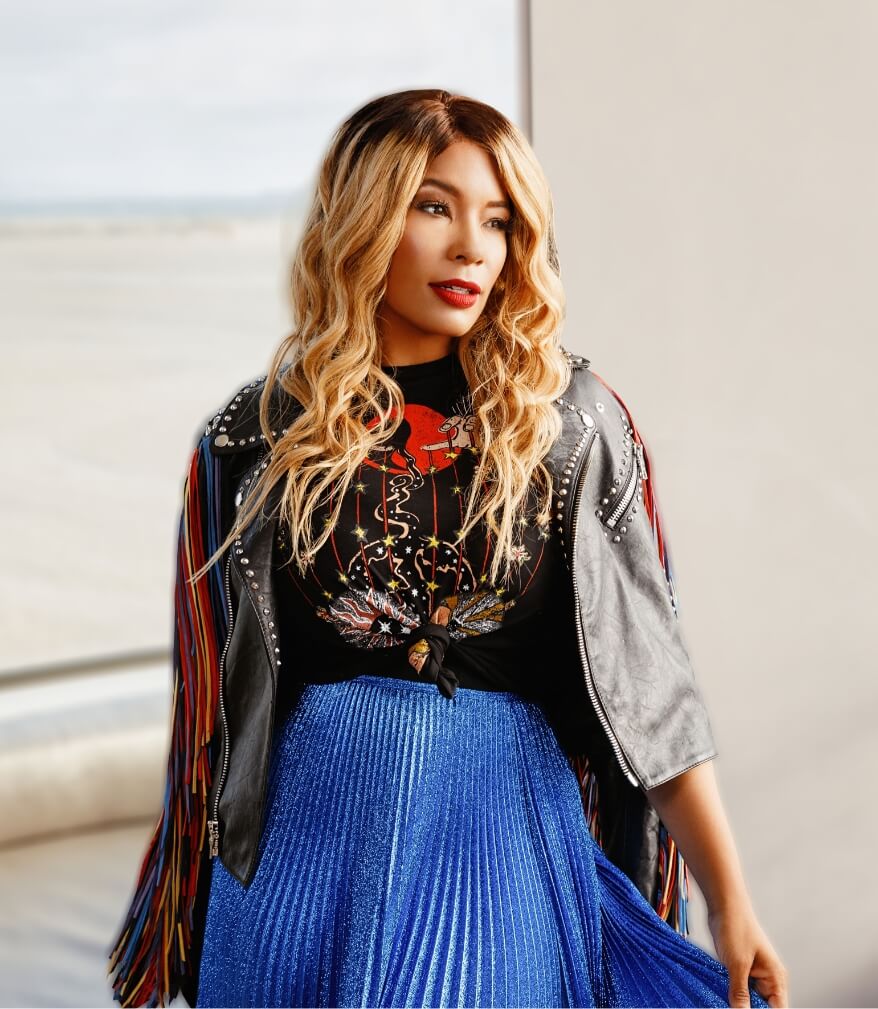 Kwanza Jones wearing Blue dress and leather jacket Kwanza Jones wearing Blue dress and leather jacket