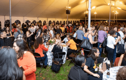 Princeton alumnae gather at tables under large tent