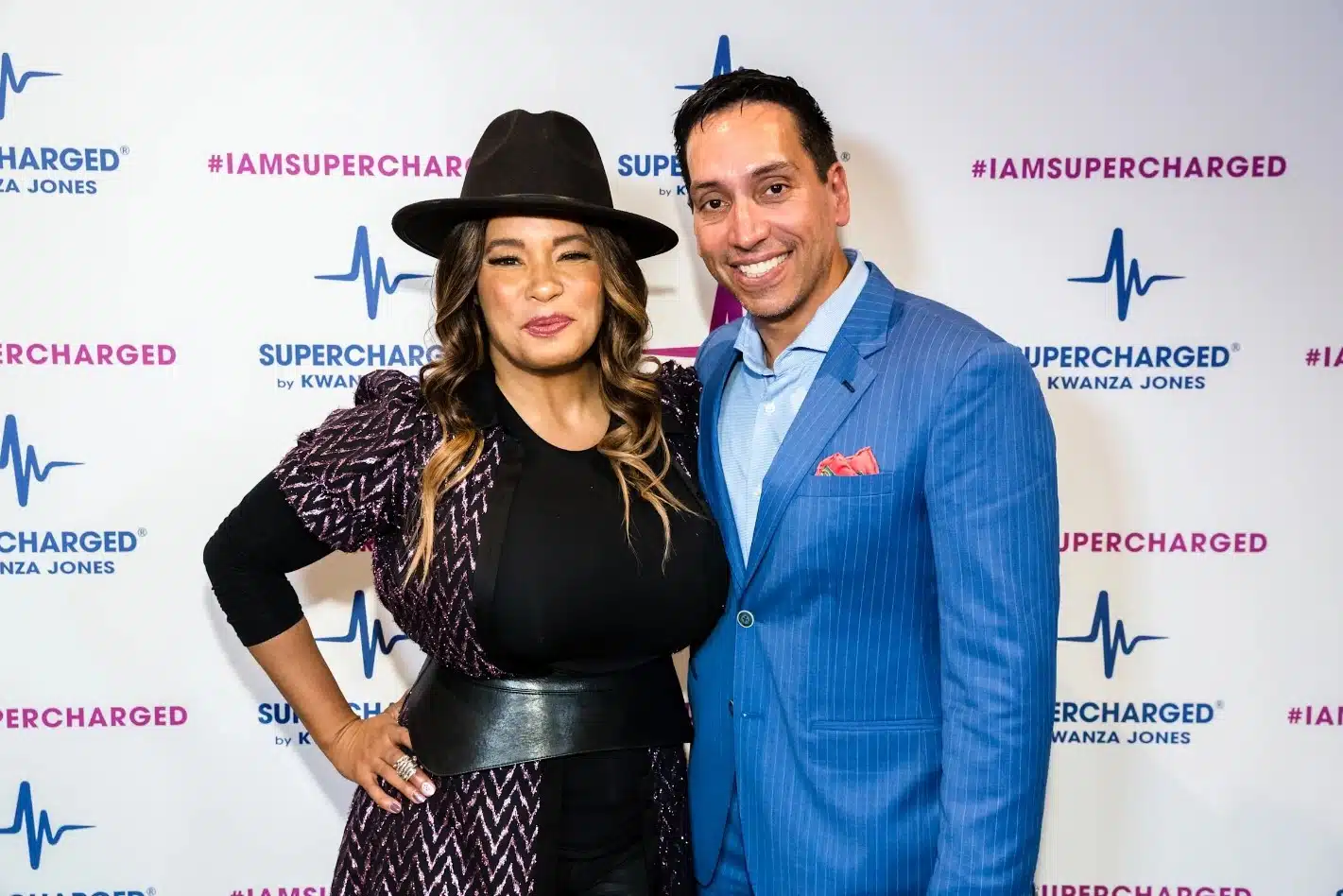 kwanza-jones-jose-feliciano-at-a-supercharged-event-getty
